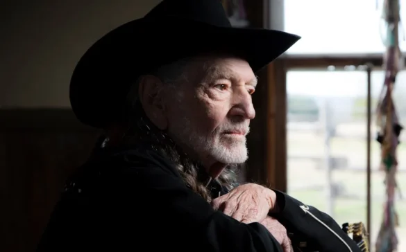 Willie nelson looking out of a window