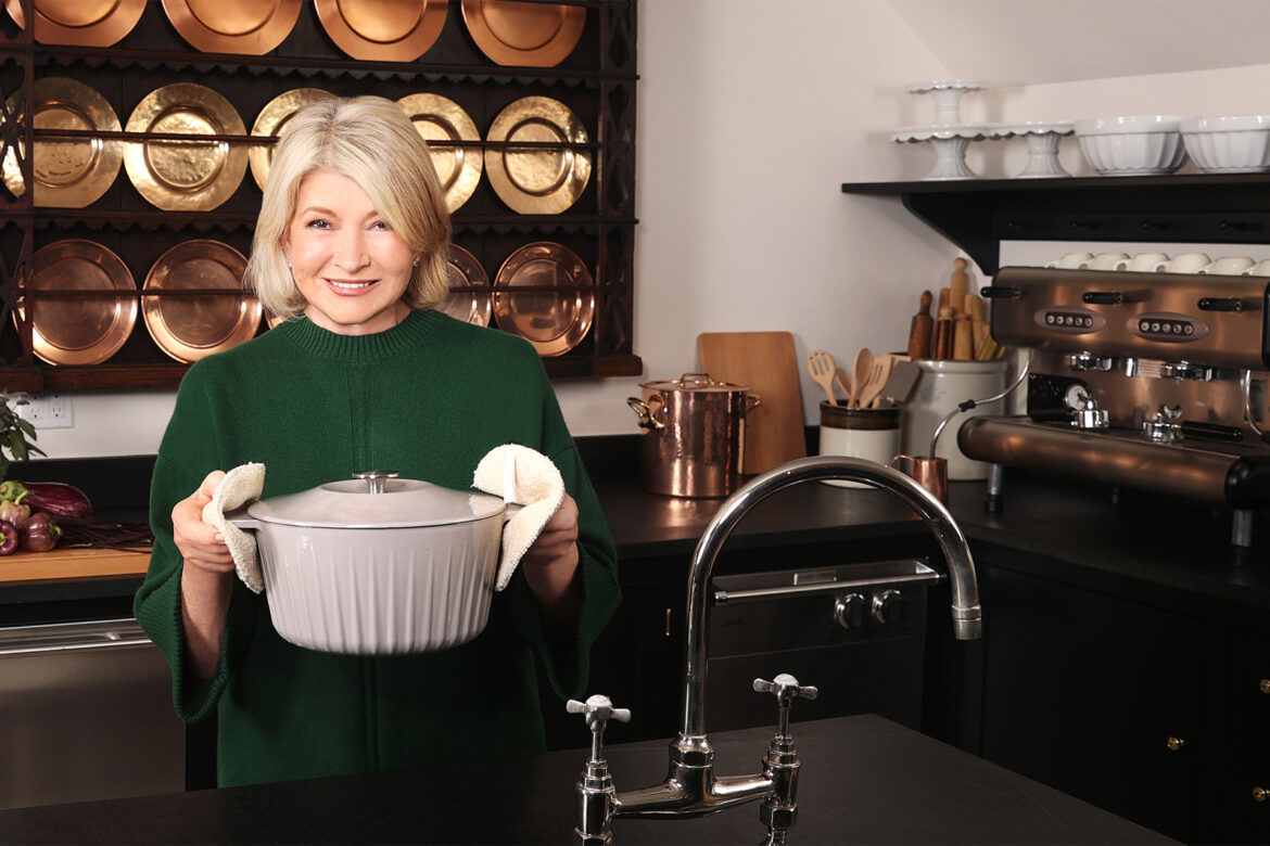 Martha Stewart holding cooking pot